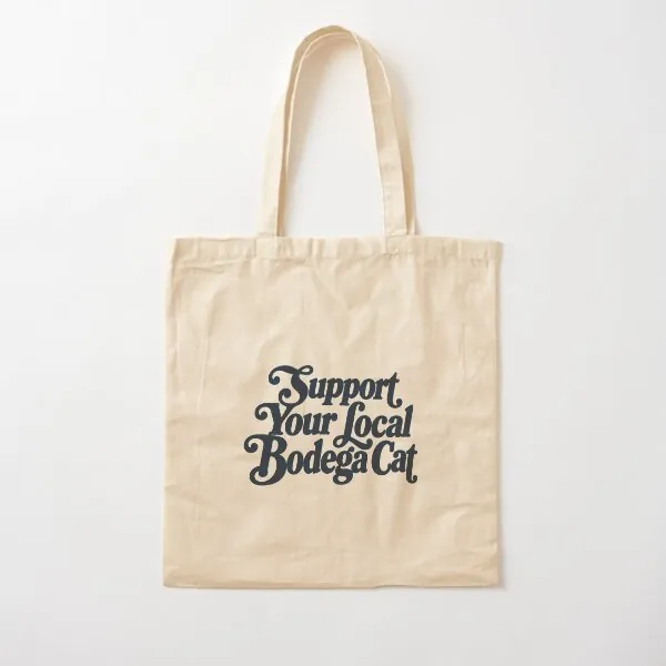 Natural cotton tote with Support Your Local Bodega Cat in navy script lettering